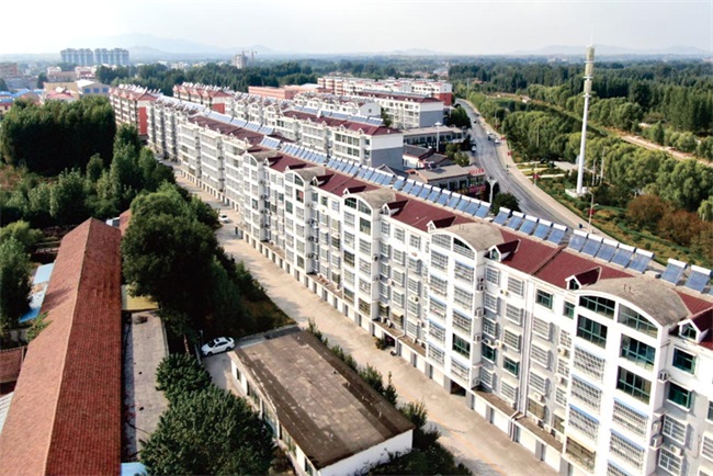 小区供暖用空气能采暖机，居民纷纷竖起大拇指